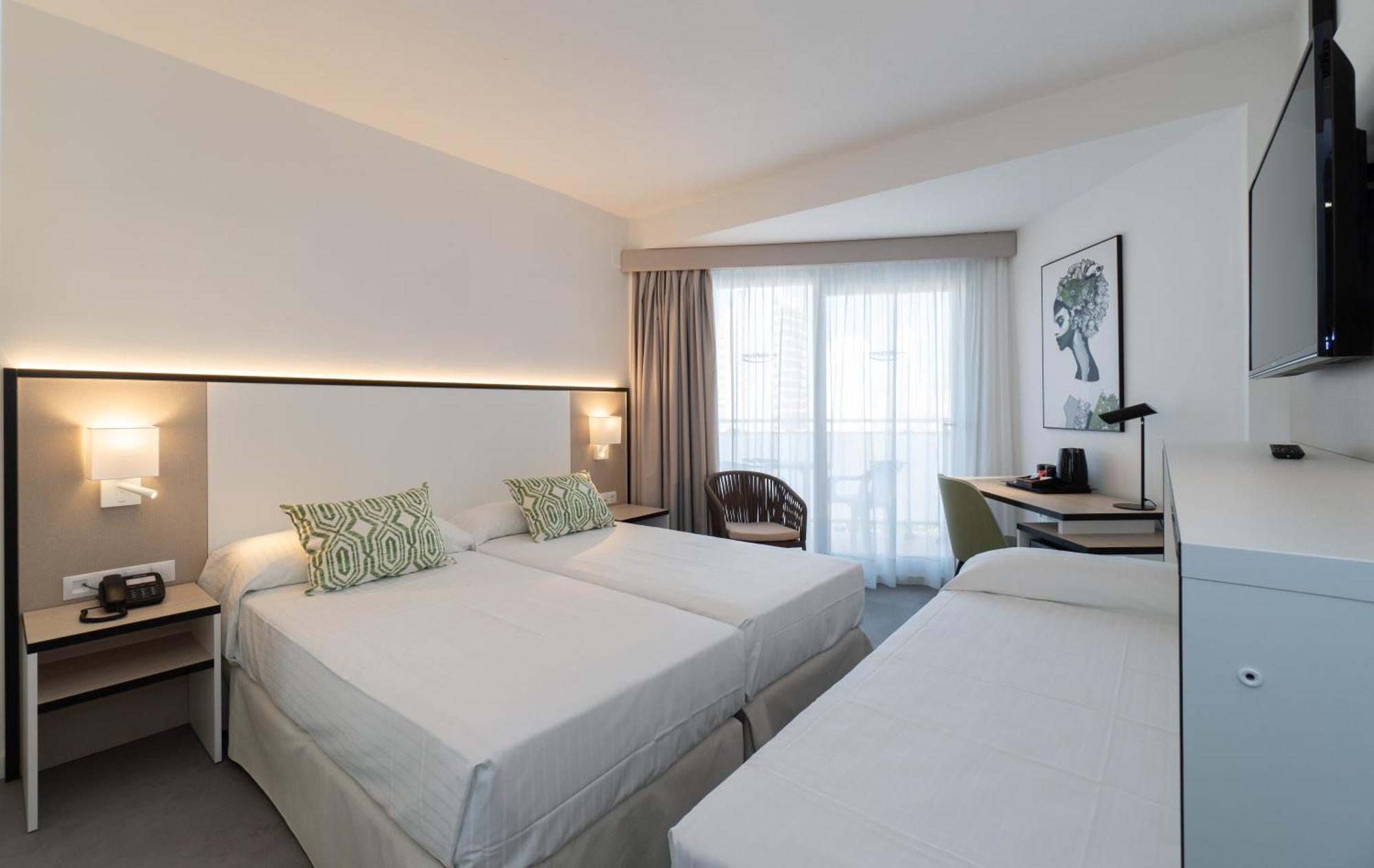 Twin Room with Balcony (2 Adults + 1 Child)