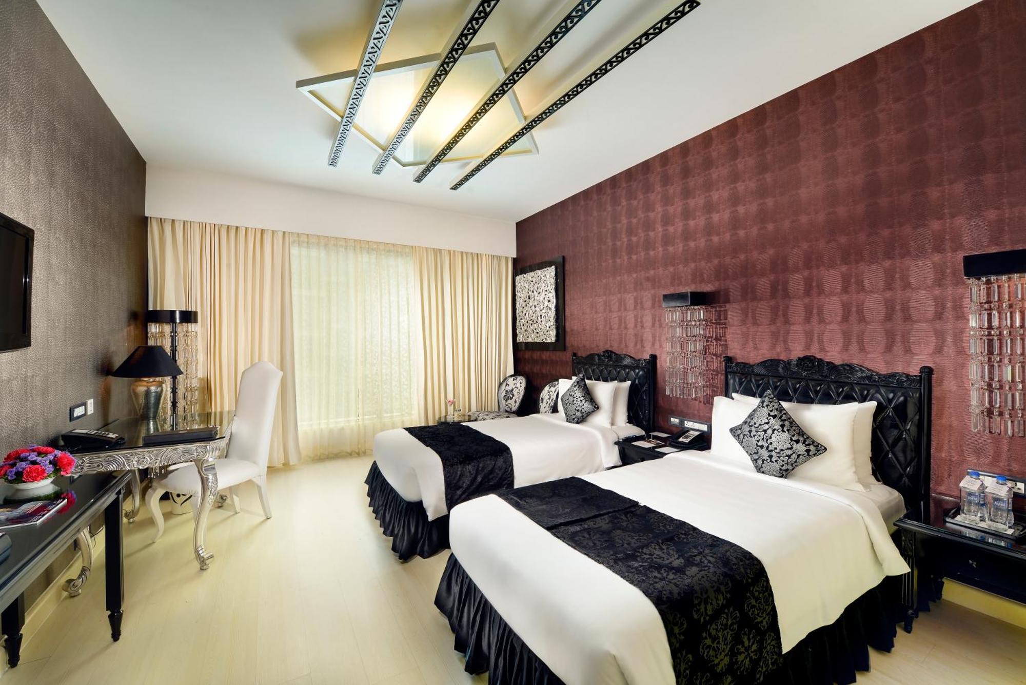 Zuri Club Room with Twin Beds with 01 way Airport transfer,10% Discount on Food and Soft Beverage