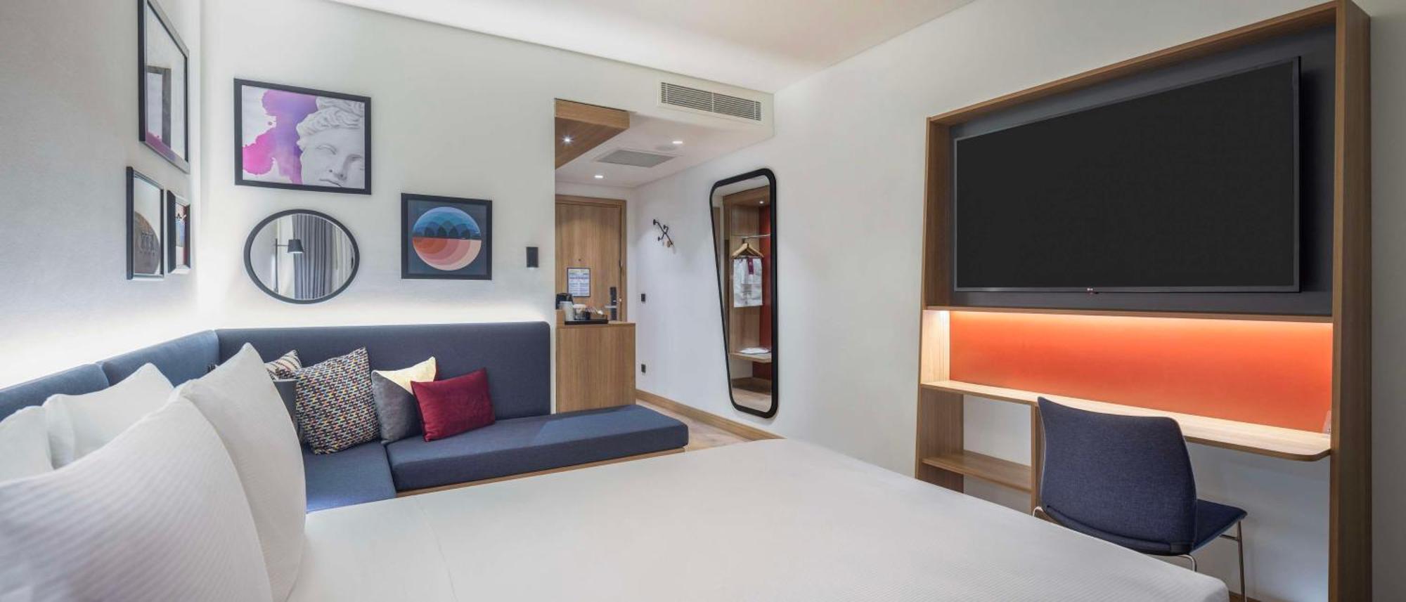 Kamer met Queensize Bed en Slaapbank