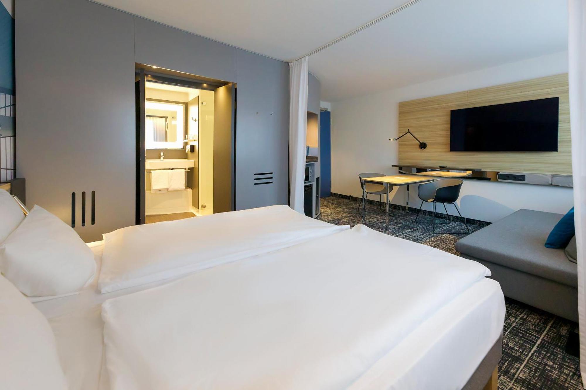 Standard-suite med 2 enkeltsenge og sovesofa