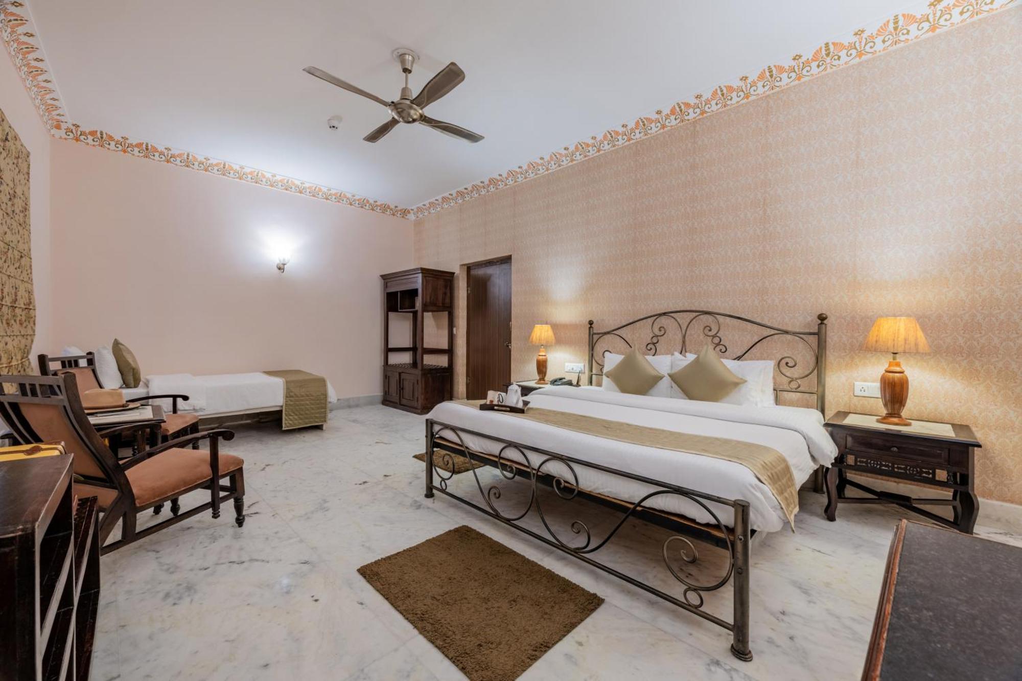 Deluxe Triple Room - Includes free pickup from airport/ train station / bus station via tuk-tuk, & a dedicated travel desk to assist with local sightseeing tours, intercity travel arrangements & activities.