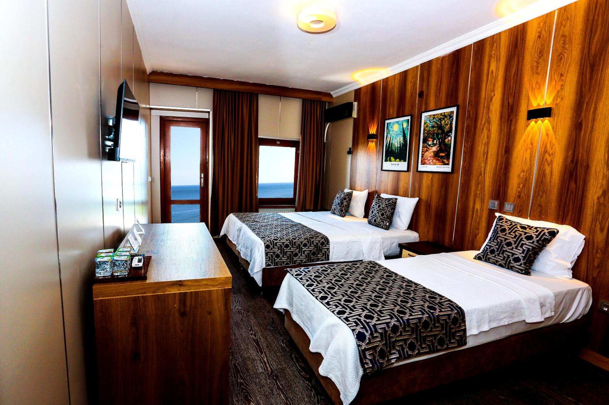 Deluxe Triple Room Sea View