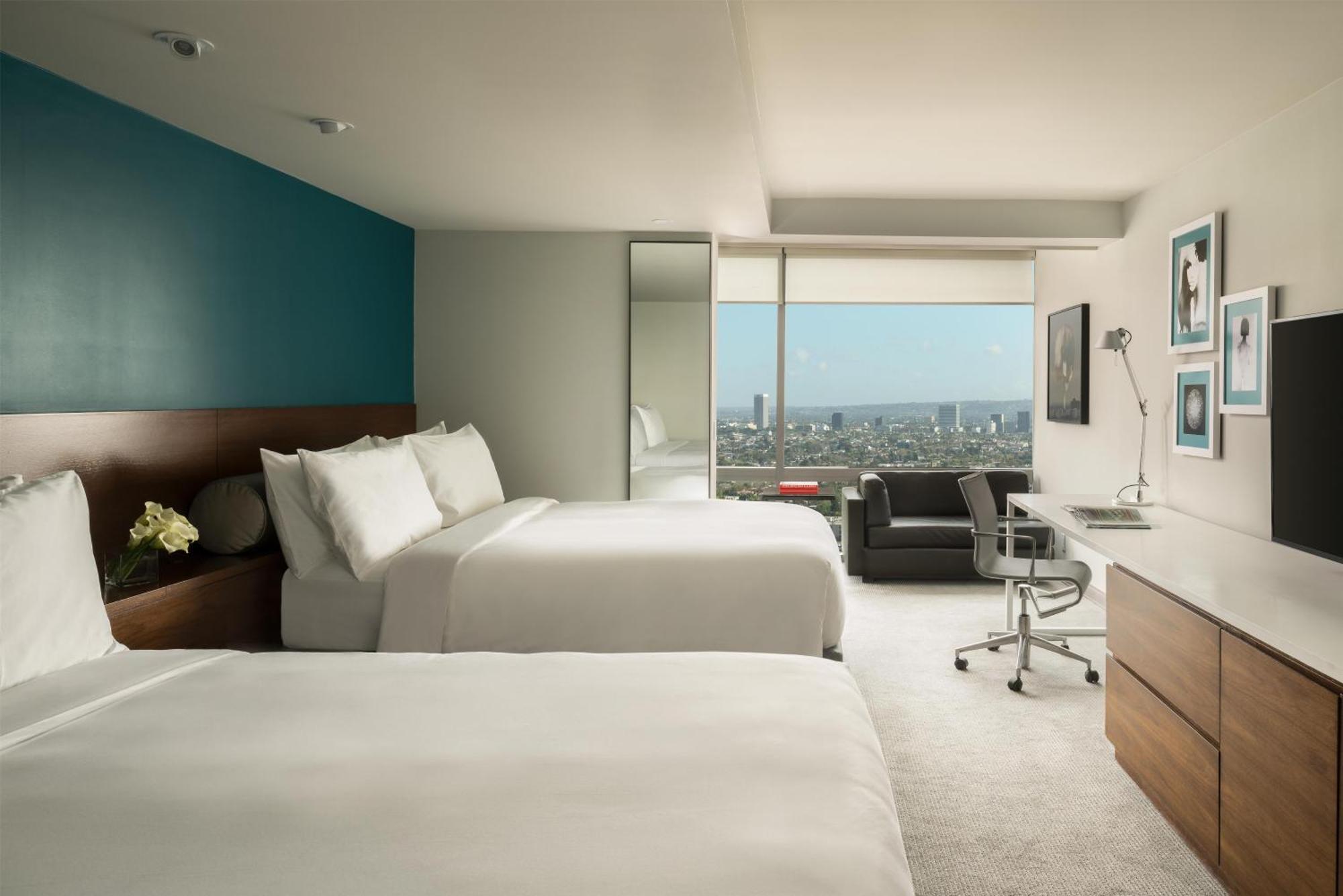 Queen Room with Two Queen Beds and Street View