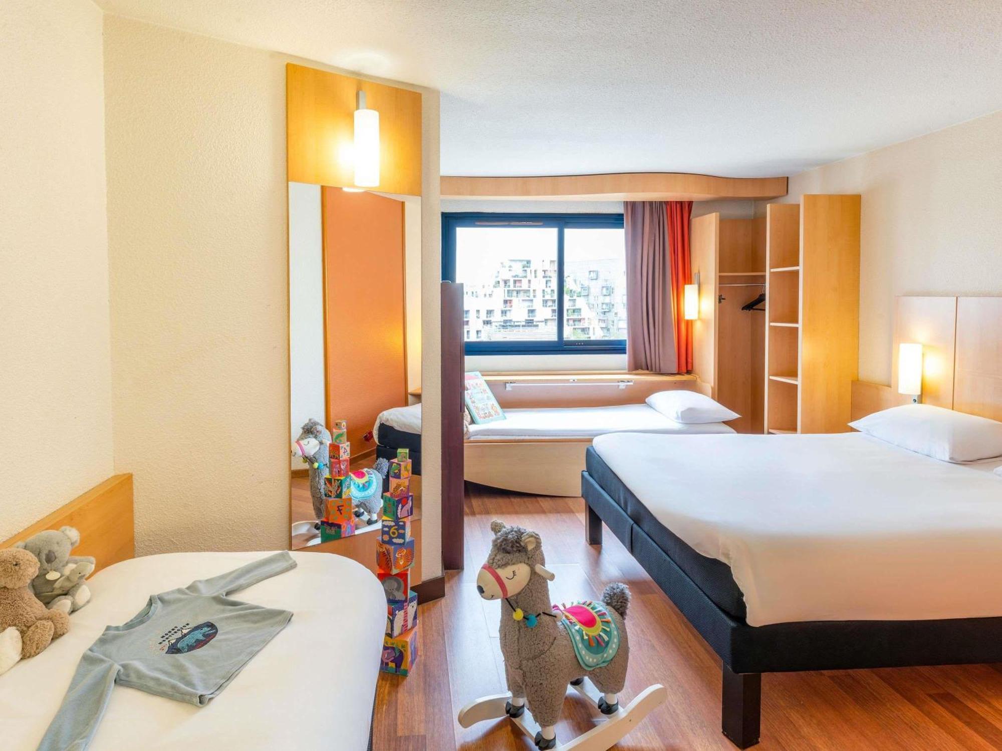 Room with 1 Double Bed and 2 Single Beds
